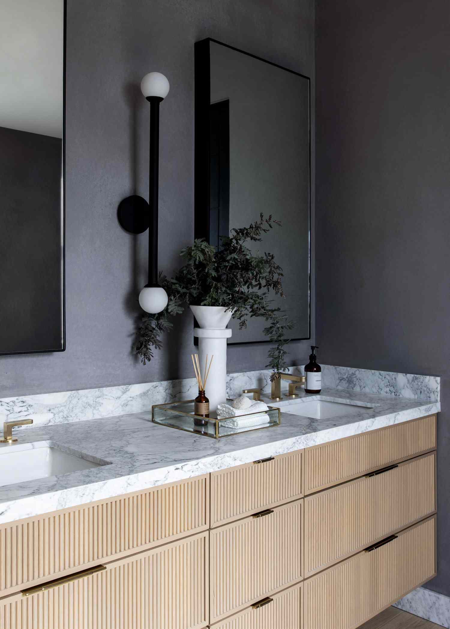 Marble bathroom vanity installed by Amici Stone